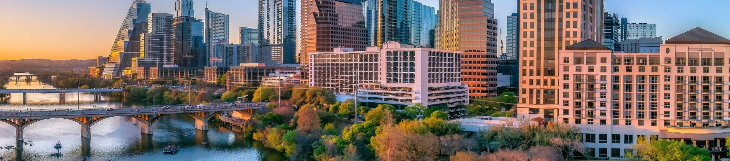 Austin Texas skyline at sunset over Lady Bird Lake