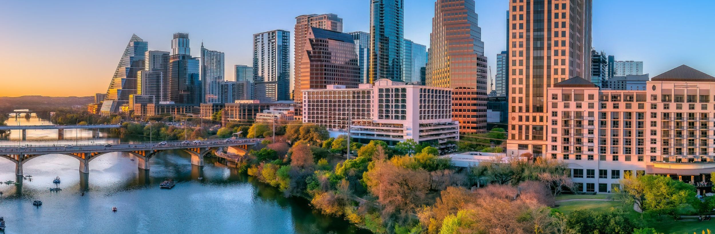Austin Texas skyline at sunset over Lady Bird Lake