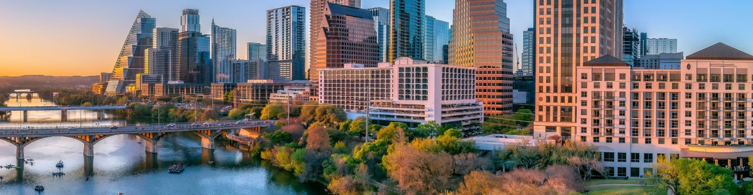 Austin Texas skyline at sunset over Lady Bird Lake