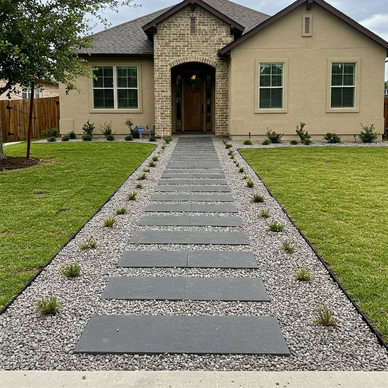 Custom drainage system design and installation in Austin yard