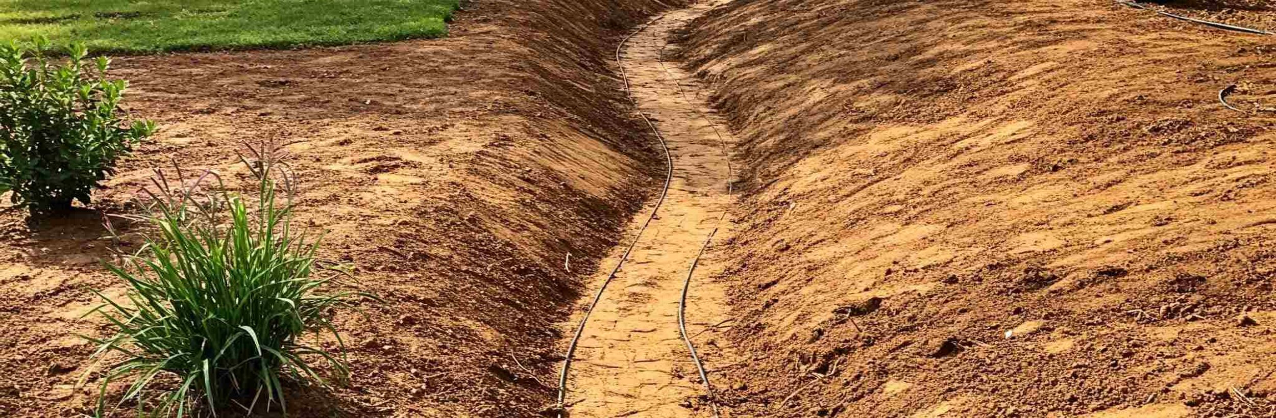 Yard grading and re-grading for drainage in Austin