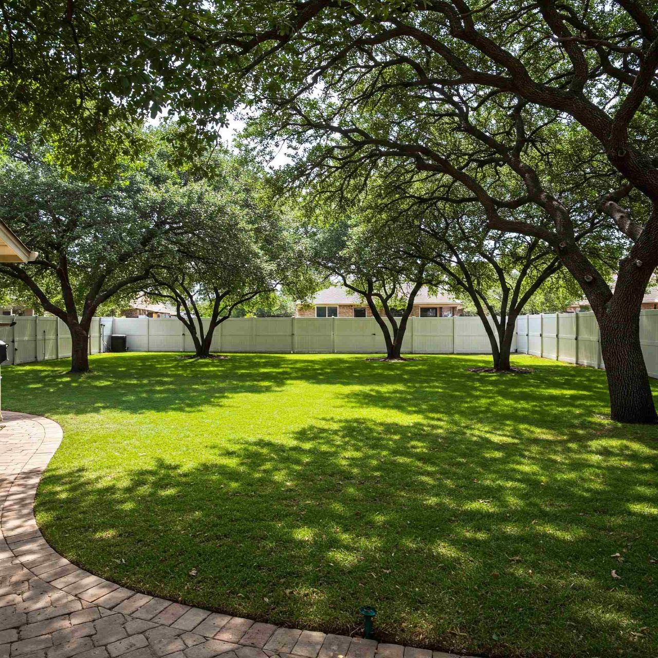 Leveling uneven and settled yard in Austin neighborhood