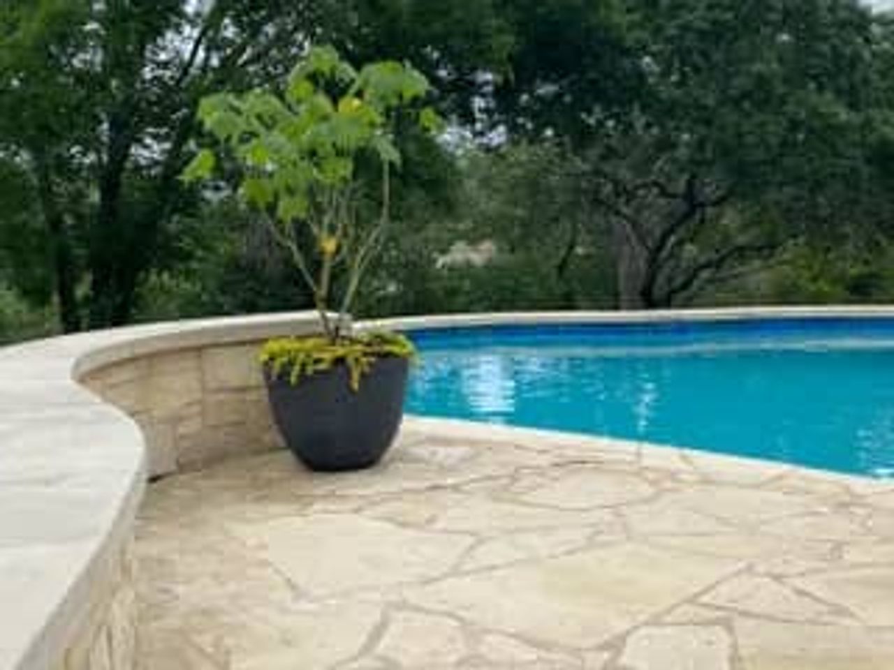 Natural stone and flagstone patio in an Austin backyard