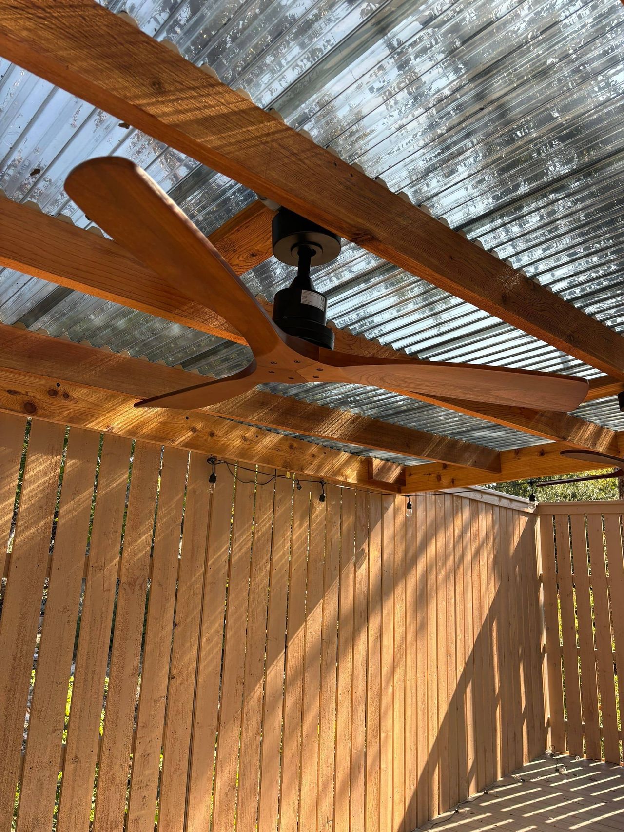 Pergola with ceiling fans and lights in Austin, TX