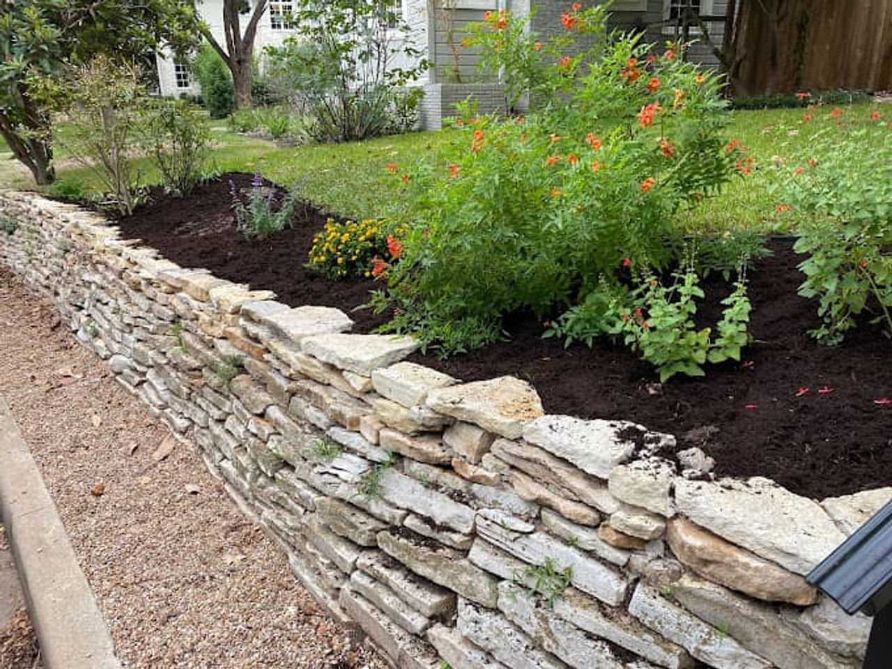 Decorative stone borders for Austin landscape beds