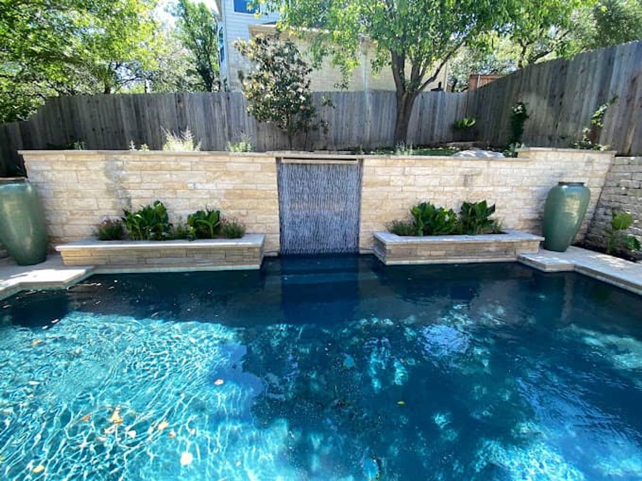 Custom fountain and waterfall installation in Austin