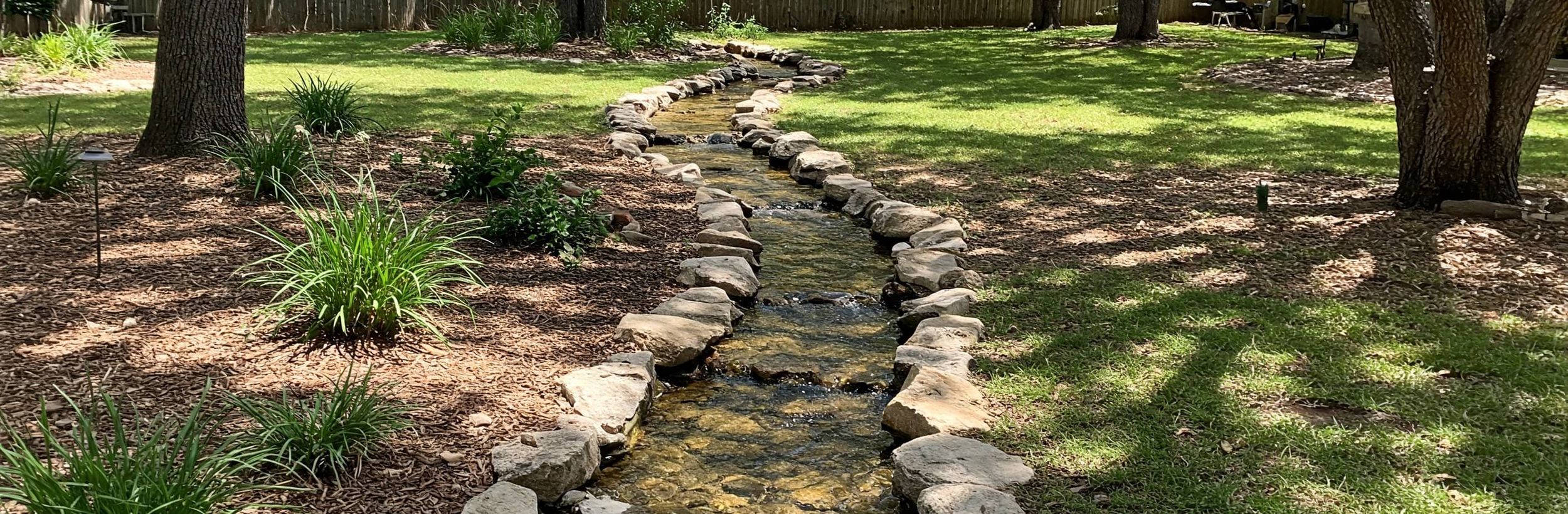 Fire pit and water feature installation in Austin, TX